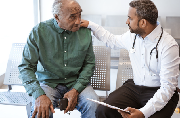 Photo of doctor and patient demonstrating good bedside manner