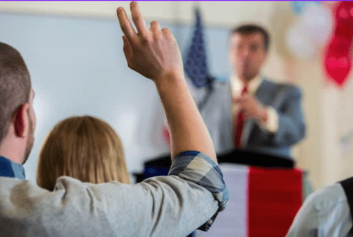 Photo of a teacher calling on a student to answer a question